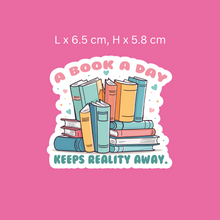 Load image into Gallery viewer, A Book A Day Keeps Reality Away Sticker
